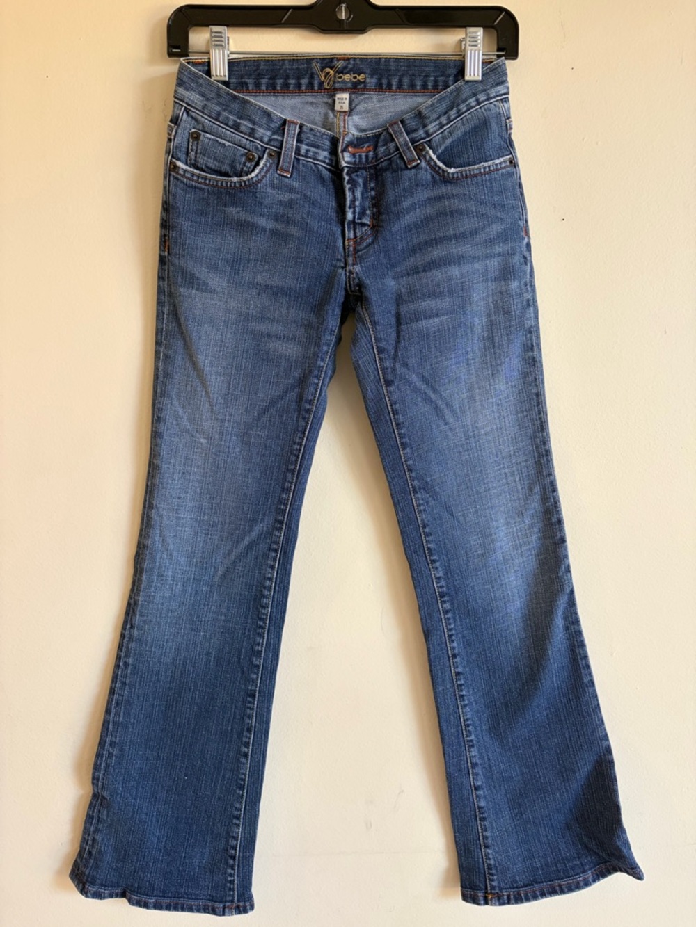 Bebe Low Rise Medium Wash Jeans Size 25